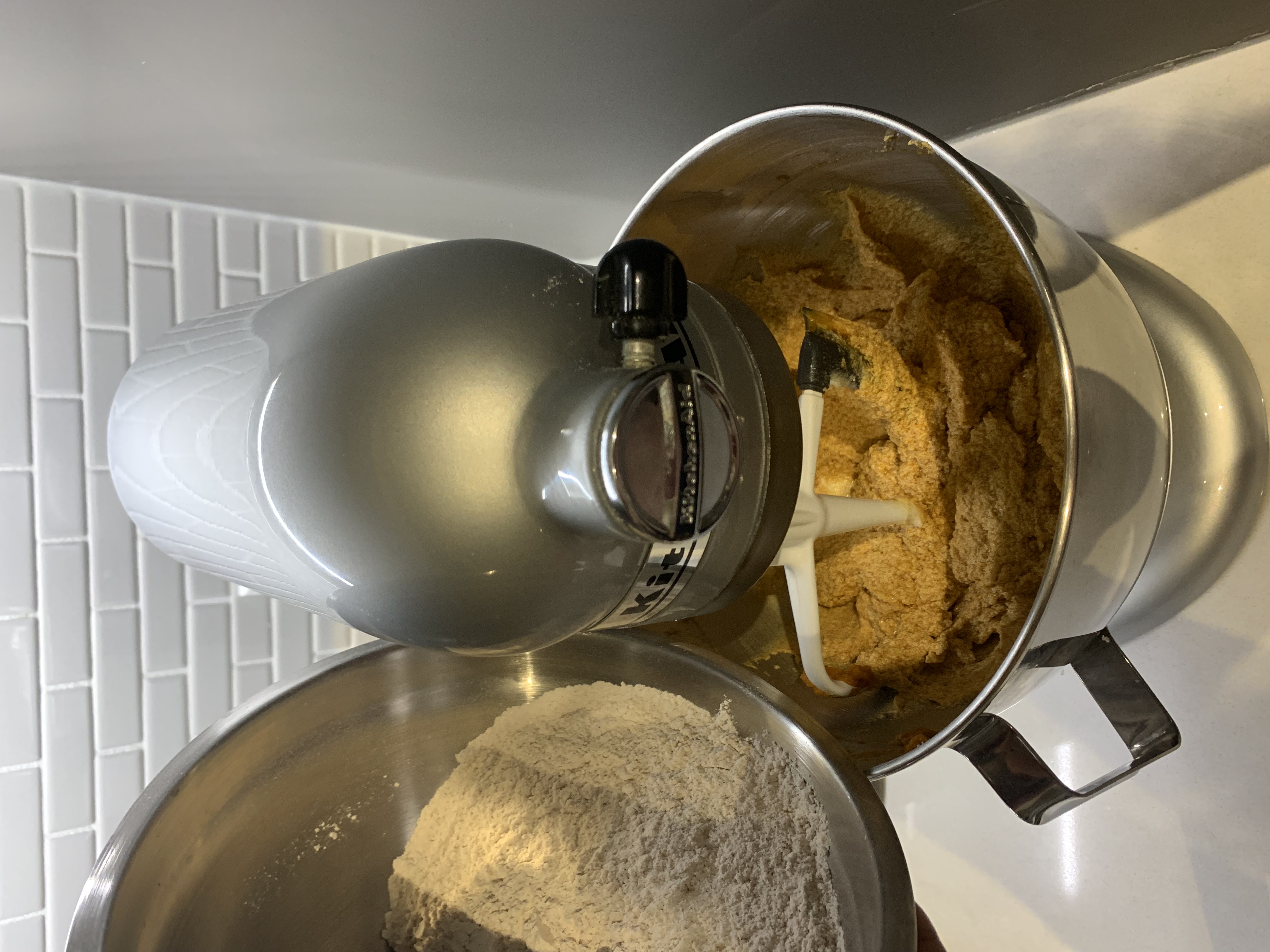 stand mixer with flour being added