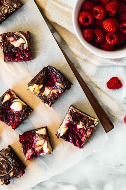 top down view of raspberry cheesecake brownies cut into squares