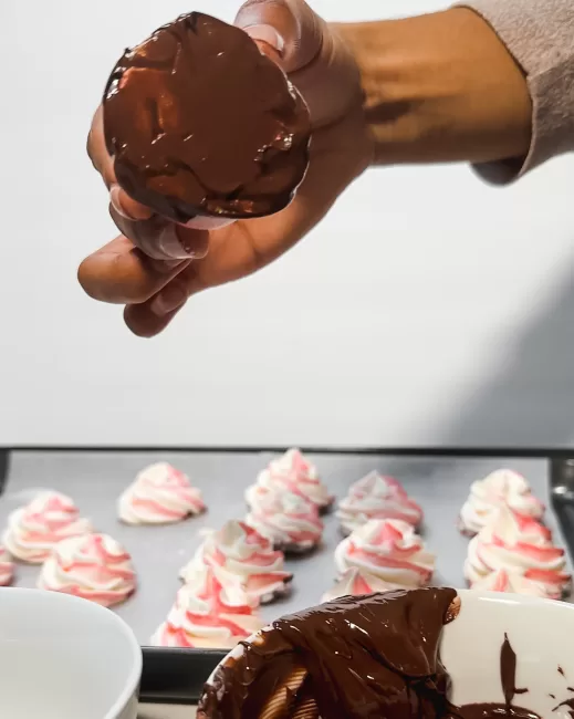 peppermint meringue dipped in melted chocolate 