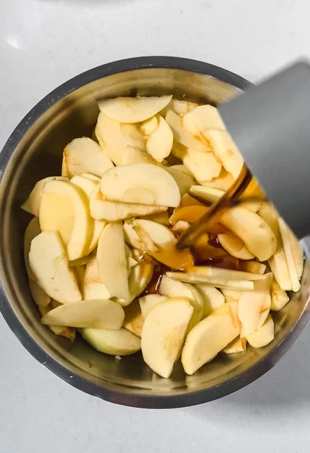chopped apples with maple syrup