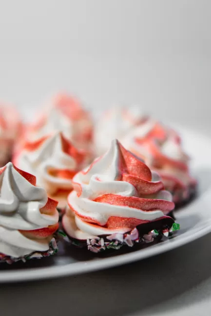 chocolate dipped peppermint meringues close up