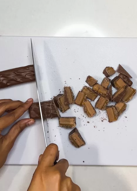 chopping chocolate mars bars