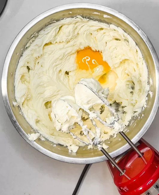 egg added to cream cheese mixture
