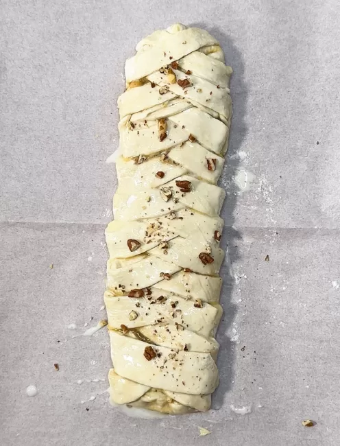 egg washed Maple Pecan Pastry Braid before baking