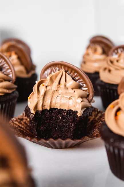 Chocolate Orange Cupcakes unwrapped with a bite out of one