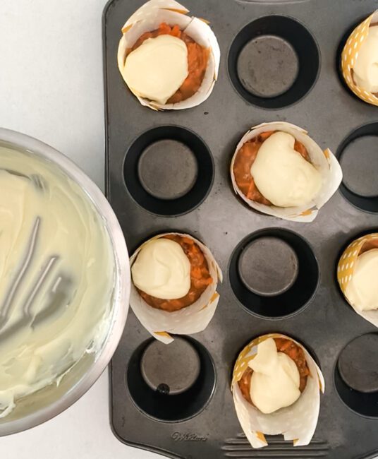 cream cheese filling added to carrot cake muffin batter