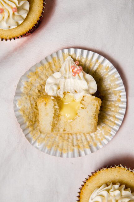 top down view of Champagne Cupcakes with a bite taken