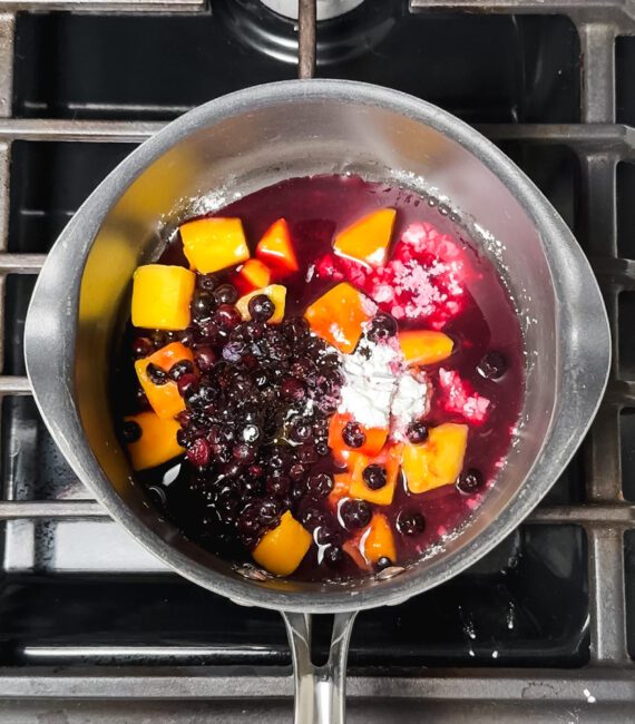 fruit, maple syrup, cornstarch and water in a sauce pan
