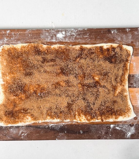 cinnamon spread over puff pastry