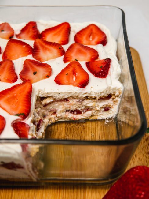 Strawberry Icebox Cake with a slice taken out