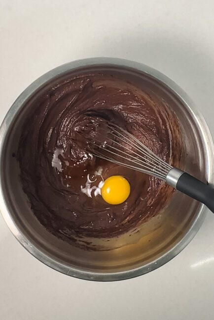 egg and vanilla added to wet brownie batter