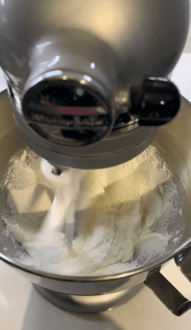 butter, oil, sugar, baking powder, baking soda, and salt in a mixer 