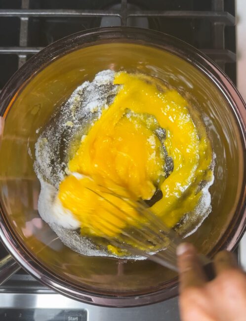 mixing egg yolk and sugar